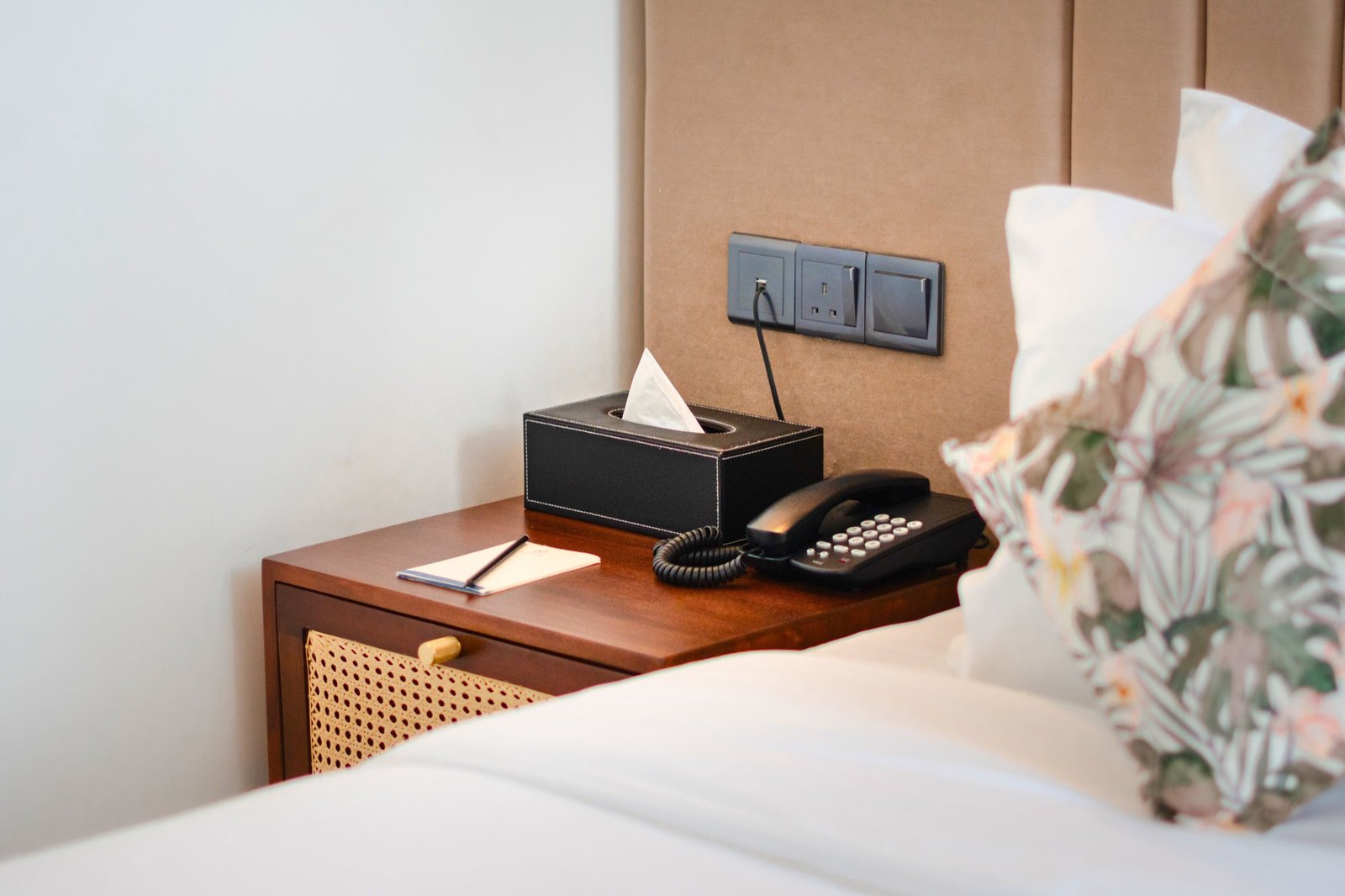 Bedside telephone and woven cabinet detail