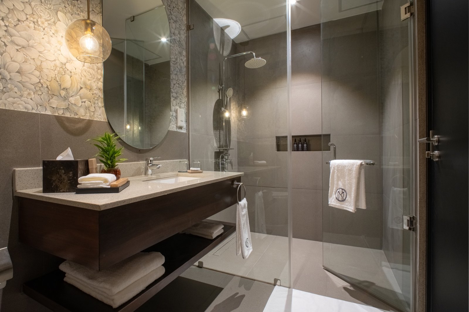 Walk-in shower and vanity in an MK Colombo bathroom