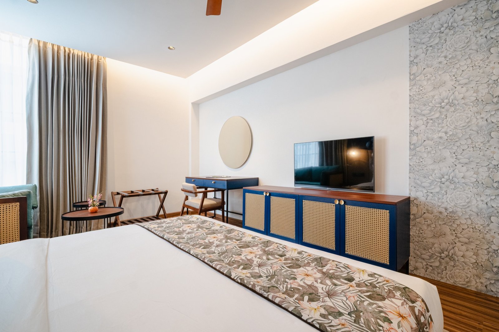 Room media console and blue feature wall